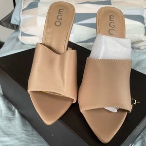 Pointed Peep Toe Mule in Nude